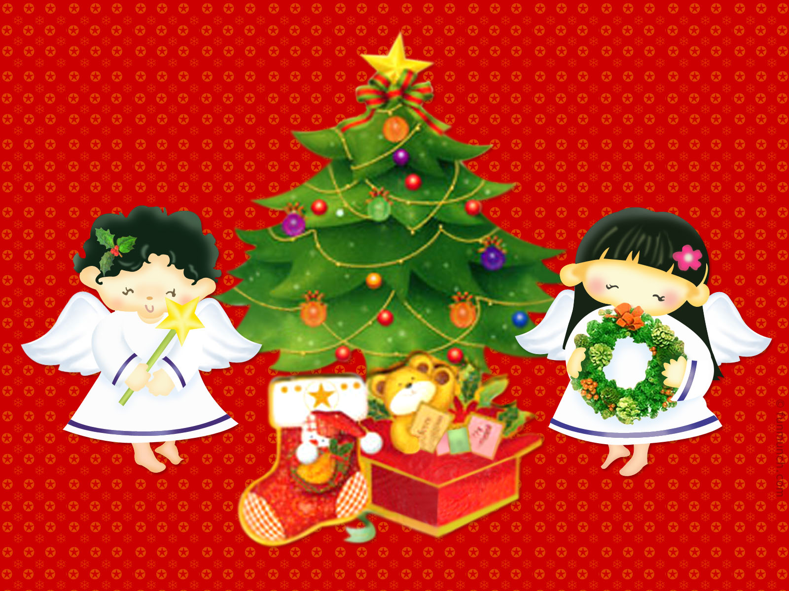 Angeles junto a un arbol